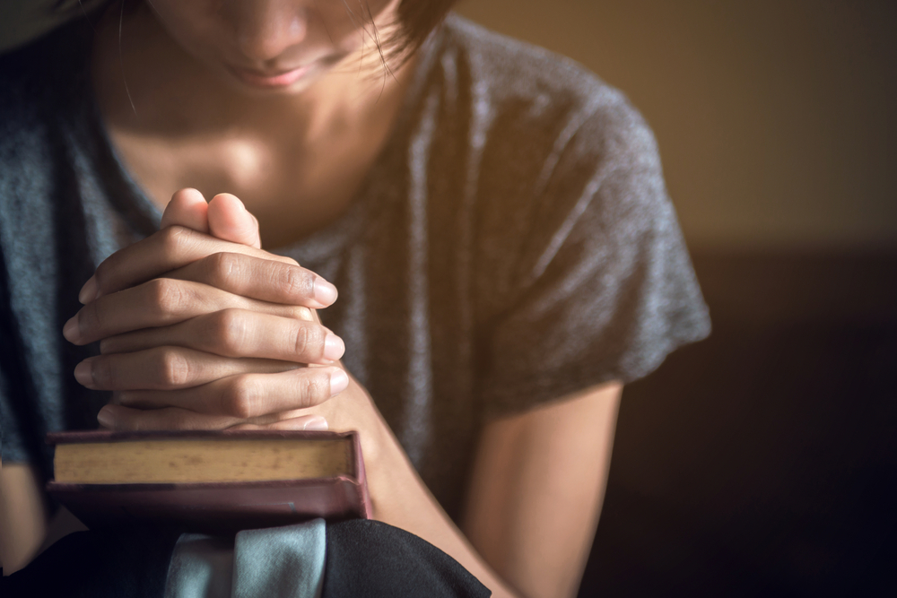 Paula White Ministries | Woman Praying